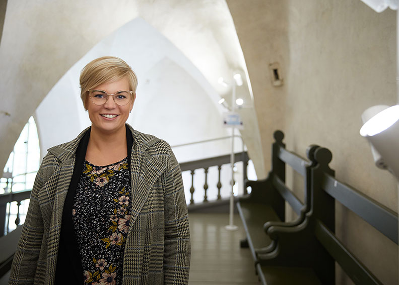 Krista Eloneva, Property and Procurement Manager at Porvoo parish, inside Porvoo medieval cathedral.